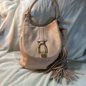 G.I.L.I. Pebble Leather Stirrup Convertible Hobo Bag with Fringe Tassel